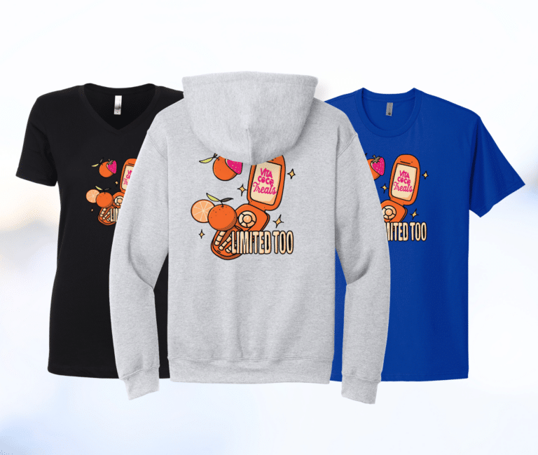 Custom printed apparel featuring Vita Coco Treats logo with oranges, bottle graphic, and decorative sparkles.