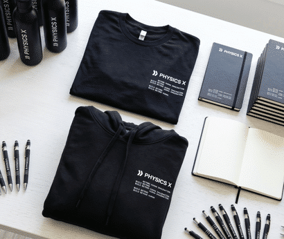 Custom branded T-shirt, hoodie, notebooks, pens, and water bottles displayed as part of a corporate employee swag collection.