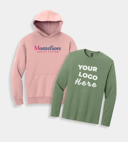A pink Montefiore Health System hoodie and a green long-sleeve shirt with customizable logo at the middle.